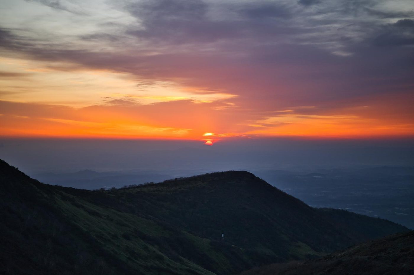Sunset glowing over mountain ridges
