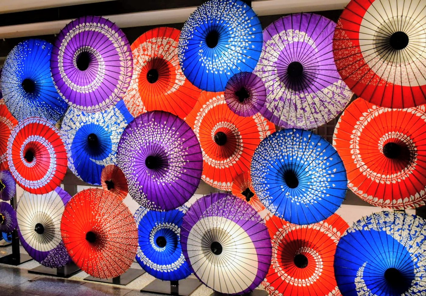 Colorful traditional Japanese umbrellas (wagasa) layered together